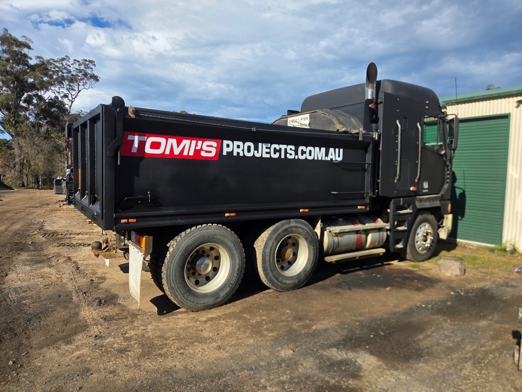 Tomi's Projects dump truck on site